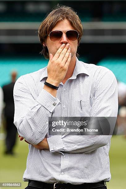 Former Australian cricketer, Nathan Bracken awaits the funeral service held in Macksville for Australian cricketer Phillip Hughes at the Sydney...