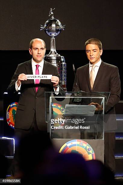 Sergio Jadue President of the Chilean Football Association holds the name of River Plate during the Official Draw of the 56th Copa Bridgestone...