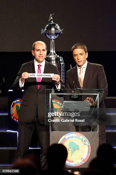 Sergio Jadue President of the Chilean Football Association holds the name of Atletico Nacional during the Official Draw of the 56th Copa Bridgestone...