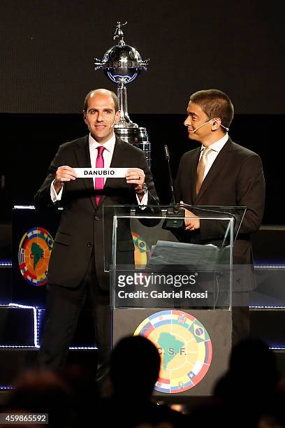 Sergio Jadue President of the Chilean Football Association holds the name of Danuebio during the Official Draw of the 56th Copa Bridgestone...