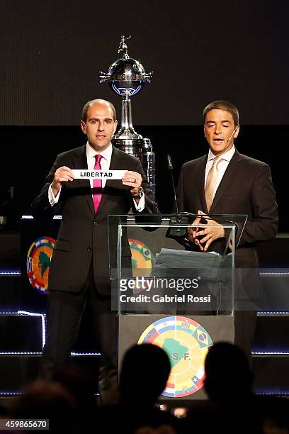 Sergio Jadue President of the Chilean Football Association holds the name of Libertad during the Official Draw of the 56th Copa Bridgestone...