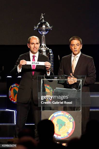 Sergio Jadue President of the Chilean Football Association holds the name of Atlas during the Official Draw of the 56th Copa Bridgestone Libertadores...