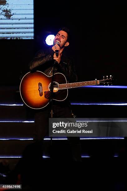 Spanish singer Alex Ubago performs during the Official Draw of the 56th Copa Bridgestone Libertadores at Conmebol Convention Center on December 2,...