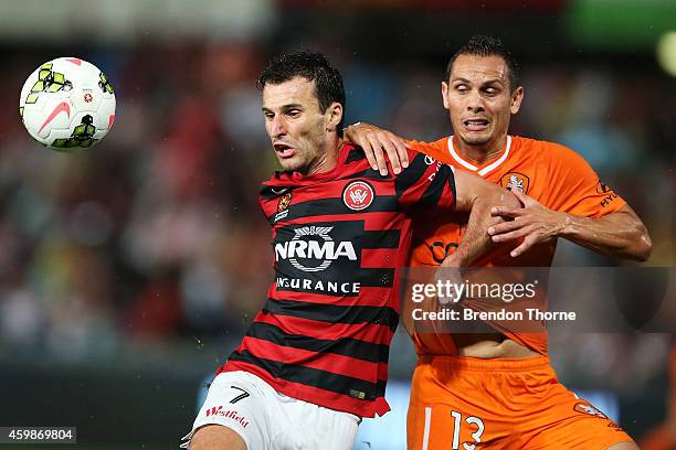 Labinot Haliti of the Wanderers competes with Jade North of the Roar during the round four A-League match between the Western Sydney Wanderers and...