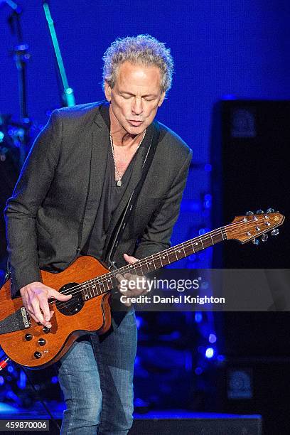 Guitarist/vocalist Lindsey Buckingham of Fleetwood Mac performs on stage at Viejas Arena on December 2, 2014 in San Diego, California.