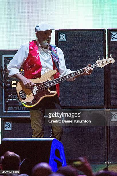 Bassist John McVie of Fleetwood Mac performs on stage at Viejas Arena on December 2, 2014 in San Diego, California.