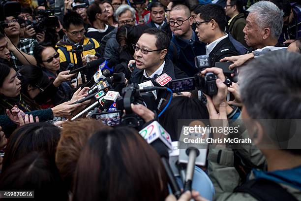 Benny Tai, one of the original pro-democracy Occupy Central founders speaks to the media after surrendering to police on December 3, 2014 in Hong...