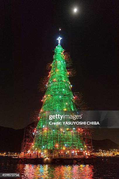 Meter-high floating Christmas tree illuminates the Rodrigo de Freitas lagoon in Rio de Janeiro, Brazil, on December 2, 2014. The world highest...