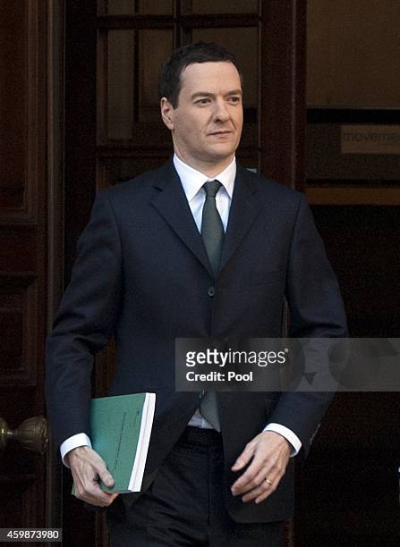 Chancellor George Osborne leaves The Treasury for Parliament on December 3, 2014 in London, England. Chancellor of the Exchequer George Osborne will...