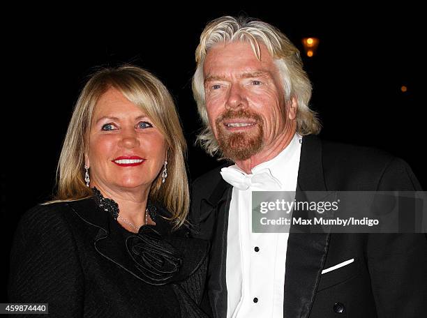 Joan Branson and Sir Richard Branson arrive at Buckingham Palace to attend a reception hosted by Queen Elizabeth II for Members of the Diplomatic...