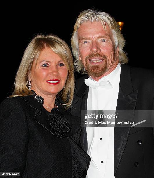 Joan Branson and Sir Richard Branson arrive at Buckingham Palace to attend a reception hosted by Queen Elizabeth II for Members of the Diplomatic...