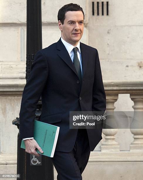 Chancellor George Osborne leaves The Treasury for Parliament on December 3, 2014 in London, England. Chancellor of the Exchequer George Osborne will...