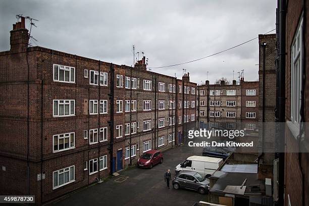 Residents of the New Era housing estate in East London return home on December 2, 2014 in London, England. On Monday many of the residents marched in...