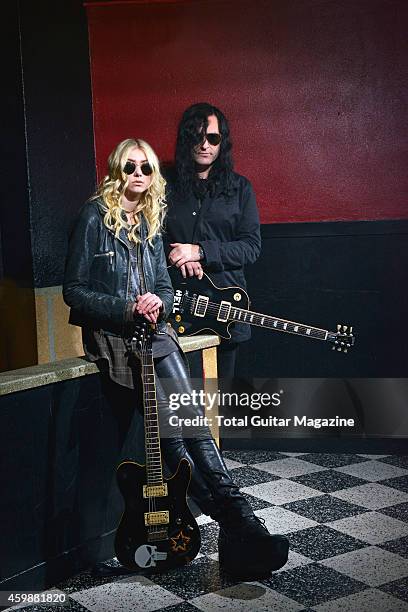 Portrait of musicians Taylor Momsen and Ben Phillips of American hard rock group The Pretty Reckless, photographed before a live performance at the...