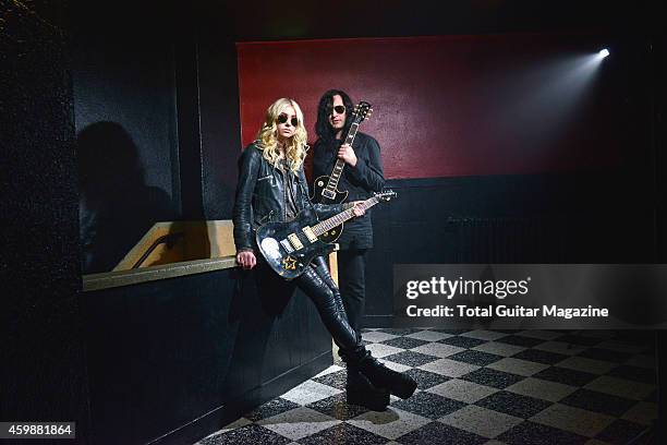 Portrait of musicians Taylor Momsen and Ben Phillips of American hard rock group The Pretty Reckless, photographed before a live performance at the...