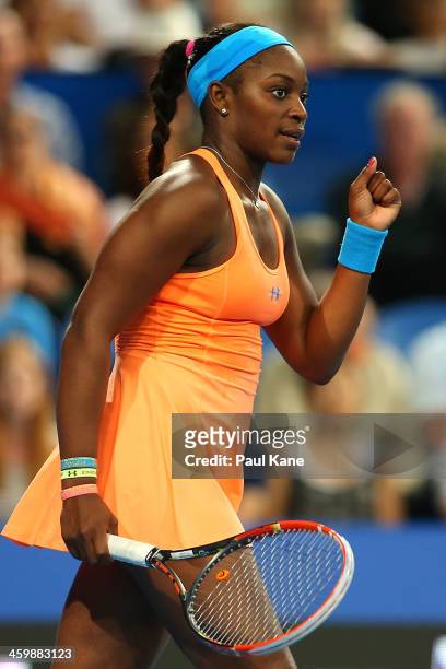 Sloane Stephens of the United States celebrates defeating Alize Cornet of France in the women's singles match during day five of the Hopman Cup at...
