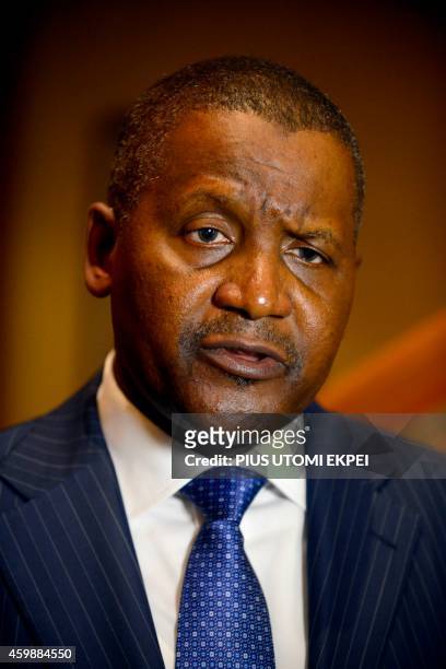 Business magnate man Aliko Dangote, ranked by Forbes Magazine as the richest man in Africa, speaks during a send off ceremony for 250 Nigerian health...