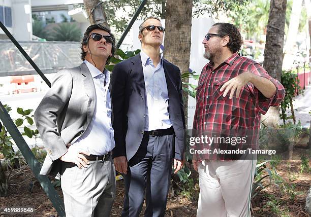 Ugo Colombo, Vladislav Doronin and Julian Schnabel are seen at the installation of Julian Schnabel's monumental sculpture 'AHAB' at Miami's Brickell...