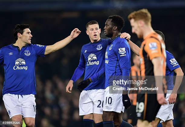 Romelu Lukaku of Everton is congratulated by teammates Gareth Barry and Ross Barkley after scoring the opening goal during the Barclays Premier...
