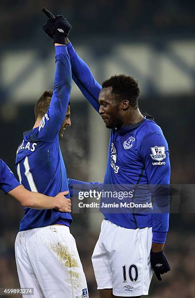 Romelu Lukaku of Everton celebrates with teammate Kevin Mirallas of Everton after scoring the opening goal during the Barclays Premier League match...