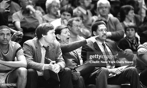 Georgetown unravels St. John's s, 85-69 Unhappy Lou Carnesecca, coach of St. John's, yells at officials and glum assistants look on as No. 1 Redmen...