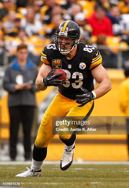 Heath Miller of the Pittsburgh Steelers runs after making a catch against the New Orleans Saints during the game on November 30, 2014 at Heinz Field...