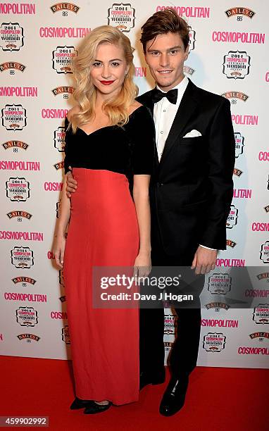 Pixie Lott and Oliver Cheshire attend the Cosmopolitan Ultimate Women of the Year Awards at One Mayfair on December 3, 2014 in London, England.