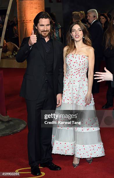 Christian Bale and Maria Valverde attend the World Premiere of "Exodus Gods and Kings" at Odeon Leicester Square on December 3, 2014 in London,...