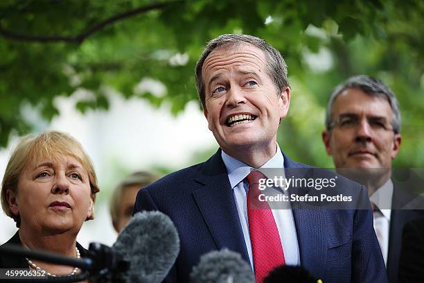 Opposition leader Bill Shorten and his colleagues speak to the media during a press conference to reflect on 'Tony Abbott's Year of Broken Promises'...