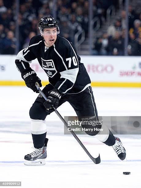 Tanner Pearson of the Los Angeles Kings controls the puck over the Boston Bruins blueline at Staples Center on December 2, 2014 in Los Angeles,...