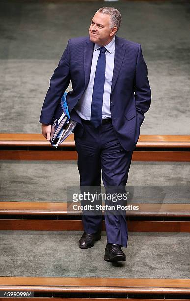 Treasurer Joe Hockey arrives for House of Representatives question time at Parliament House on December 4, 2014 in Canberra, Australia. Today is the...