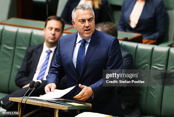 Treasurer Joe Hockey makes a Ministerial Statement in the House of Representatives at Parliament House on December 4, 2014 in Canberra, Australia....