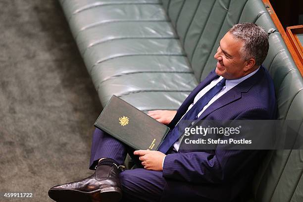 Treasurer Joe Hockey prepares to make his Ministerial Statement in the House of Representatives at Parliament House on December 4, 2014 in Canberra,...