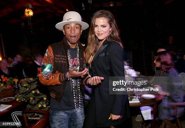 Pharrell Williams and TV personality Khloe Kardashian attend the collaboration celebration of Pharrell Williams and Adidas at Hinoki & The Bird on...