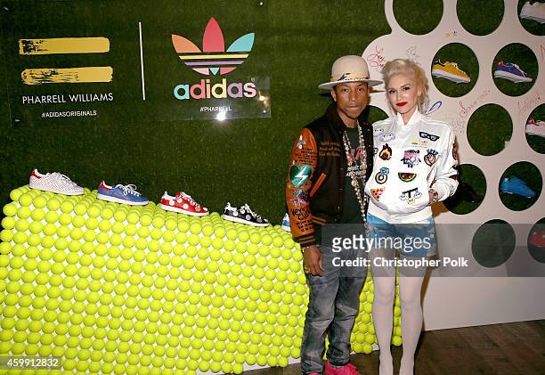 Pharrell Williams and singer Gwen Stefani attend the collaboration celebration of Pharrell Williams and Adidas at Hinoki & The Bird on December 3,...