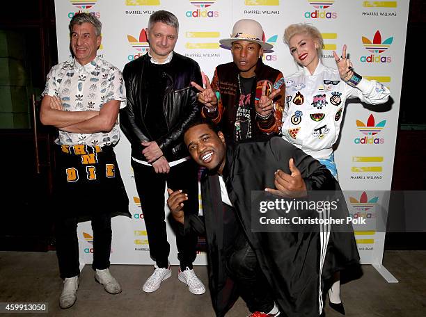 Artist Maurizio Cattelan, Adidas creative director Dirk Schonberger, Pharrell Williams, singer Gwen Stefani and ASAP Ferg attend the collaboration...