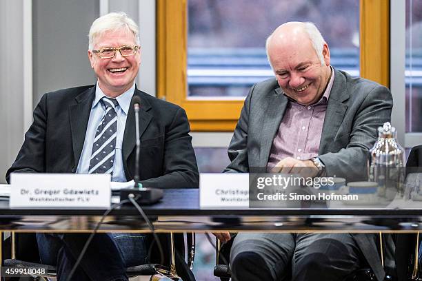 Dr. Gregor Gdawietz smiles with Christoph Schaefer , new manager of 'Westdeutscher Fussball- und Leichtathletikverband' during his Farewell...