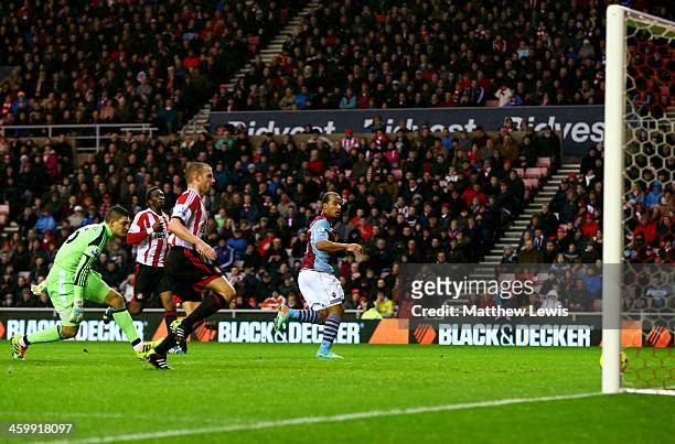 Gabriel Agbonlahor of Aston Villa scores their first goal during the Barclays Premier League match between Sunderland and Aston Villa at Stadium of...