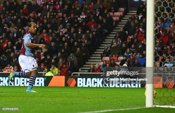 Gabriel Agbonlahor of Aston Villa scores their first goal during the Barclays Premier League match between Sunderland and Aston Villa at Stadium of...