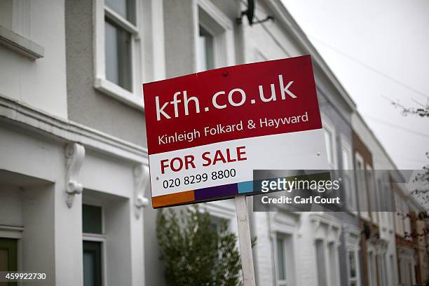 For sale' sign is seen outside a property on December 4, 2014 in in East Dulwich, London, England. In his autumn statement, Chancellor of the...