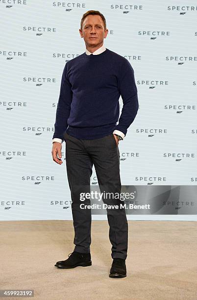 Daniel Craig attends a photocall with cast and filmmakers to mark the start of production which is due to commence on the 24th Bond Film and announce...