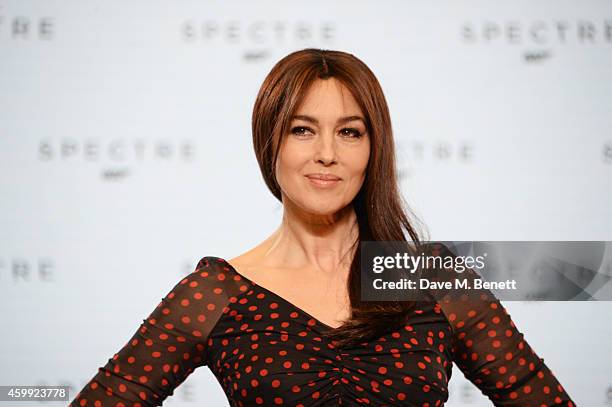 Monica Bellucci attends a photocall with cast and filmmakers to mark the start of production which is due to commence on the 24th Bond Film and...