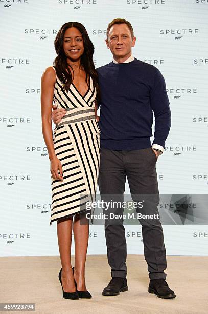 Naomie Harris and Daniel Craig attend a photocall with cast and filmmakers to mark the start of production which is due to commence on the 24th Bond...