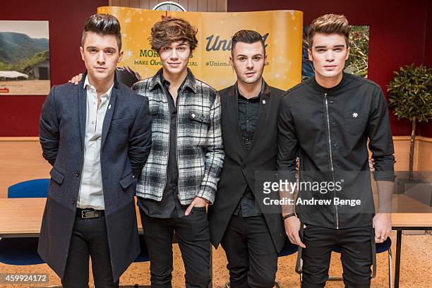 Hamblett, George Shelley, Jaymi Hensley and Josh Cuthbert of Union J sign copies of their single 'You Got It All' at Morrisons on December 4, 2014 in...