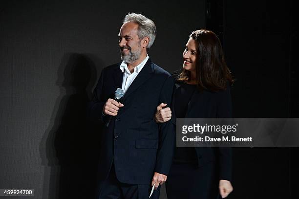 Director Sam Mendes and producer Barbara Broccoli attend a photocall with cast and filmmakers to mark the start of production which is due to...
