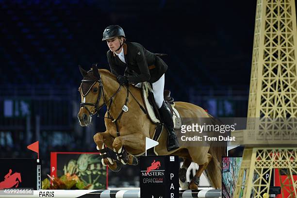 Titouan Schumacher from France rides Quinquet d'Ivraie at the Feel Green Prize - Prestige Trophy as part of the Gucci Paris Masters 2014 on December...
