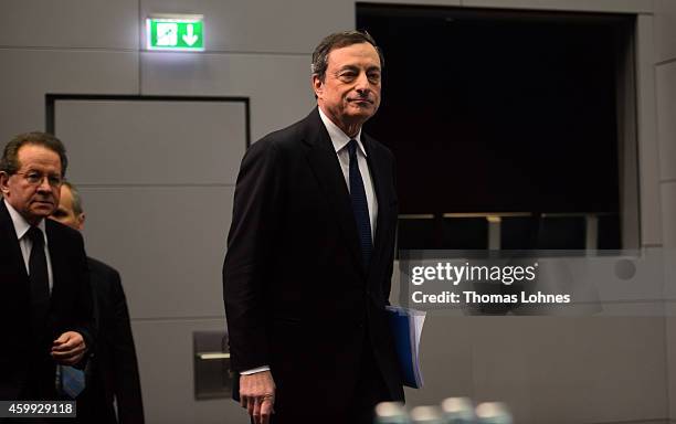 Mario Draghi, President of the European Central Bank and vice president Vitor Constancio arrive for the first press conference following the monthly...