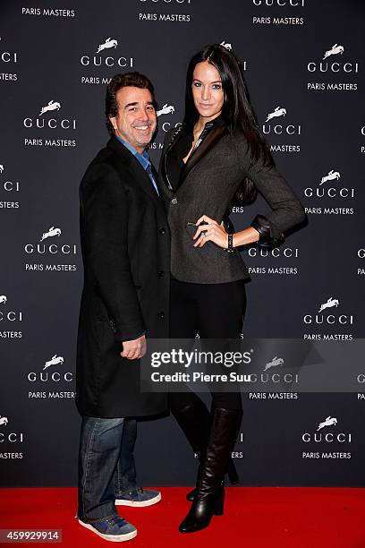 Arnaud Lagardere and Jade Foret attend the Gucci Paris Masters 2014 on December 4, 2014 in Villepinte, France.