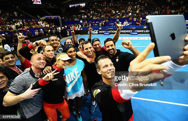 Tomas Berdych of the Singapore Slammers takes a team selfie after their victory against the UAE Royals during the Coca-Cola International Premier...
