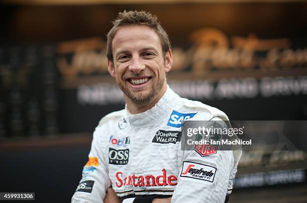 Formula 1 driver Jenson Button of McLaren helps launch Johnnie Walker responsible drinking initiative 'Join the Pact ' for the festive season, in...